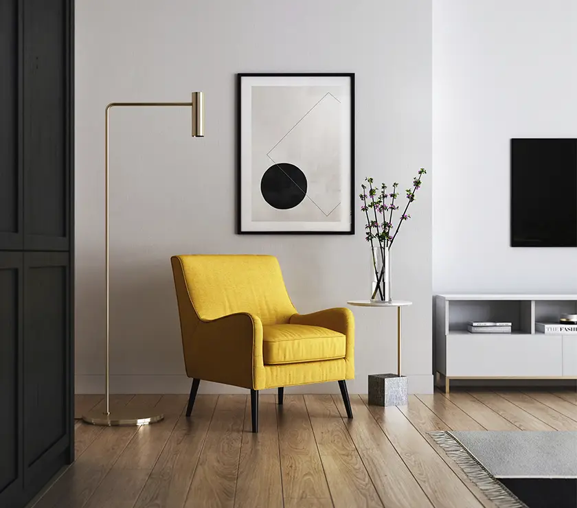 imagen de piso alquilado con un estilo moderno, limpio y un sillón amarillo moderno